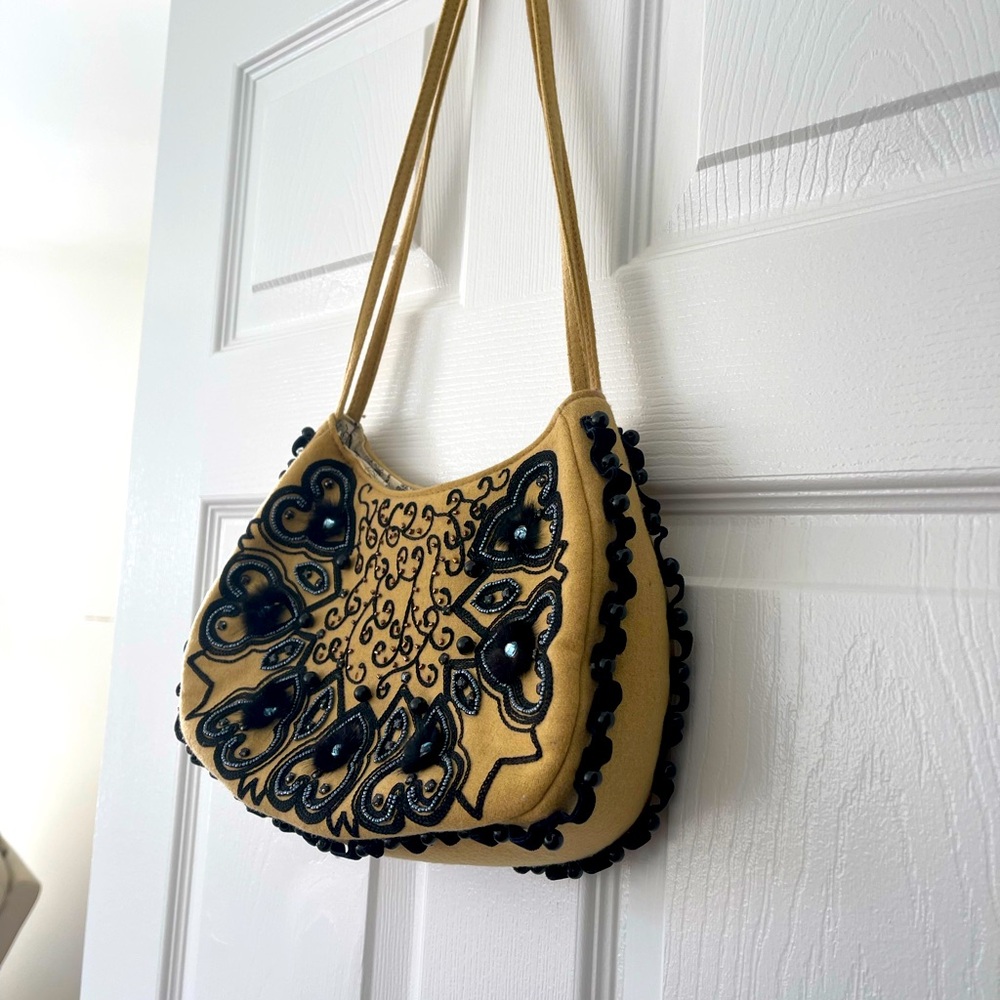 Braciano Boho style beaded shoulder bag purse in very good condition.